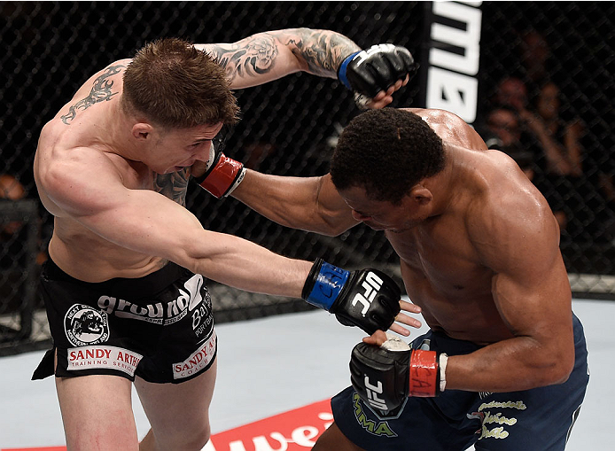 GOIANIA, BRAZIL - MAY 30: Francisco Trinaldo of Brazil punches Norman Parke of Northern Ireland in their lightweight UFC bout during the UFC Fight Night event at Arena Goiania on May 30, 2015 in Goiania. (Photo by Buda Mendes/Zuffa LLC/Zuffa LLC via Get