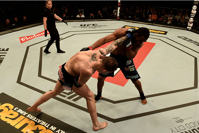 GOIANIA, BRAZIL - MAY 31: Norman Parke of Northern Ireland punches Francisco Trinaldo of Brazil in their lightweight UFC bout during the UFC Fight Night event at Arena Goiania on May 30, 2015 in Goiania. (Photo by Buda Mendes/Zuffa LLC/Zuffa LLC via Ge