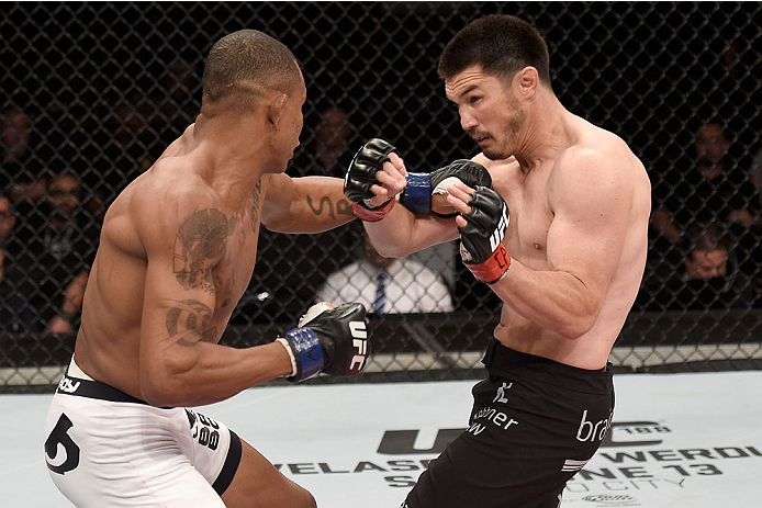 GOIANIA, BRAZIL - MAY 30: Alex Oliveira of Brazil punches KJ Noons of the United States in their welterweight UFC bout during the UFC Fight Night event at Arena Goiania on May 30, 2015 in Goiania. (Photo by Buda Mendes/Zuffa LLC/Zuffa LLC via Getty Imag