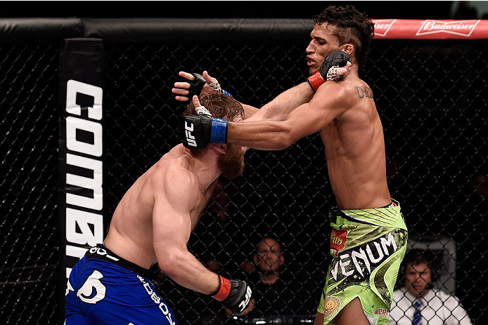 GOIANIA, BRAZIL - MAY 30: Nick Lentz of the United States punches Charles Oliveira of Brazil in their featherweight UFC bout during the UFC Fight Night event at Arena Goiania on May 30, 2015 in Goiania, Brazil. (Photo by Buda Mendes/Zuffa LLC/Zuffa LLC