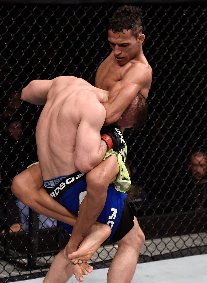 GOIANIA, BRAZIL - MAY 30: Charles Oliveira attempts to submit Nick Lentz of the United States in their featherweight UFC bout during the UFC Fight Night event at Arena Goiania on May 30, 2015 in Goiania, Brazil. (Photo by Buda Mendes/Zuffa LLC/Zuffa LLC