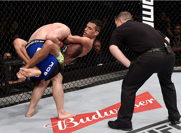 GOIANIA, BRAZIL - MAY 30: Charles Oliveira attempts to submit Nick Lentz of the United States in their featherweight UFC bout during the UFC Fight Night event at Arena Goiania on May 30, 2015 in Goiania, Brazil. (Photo by Buda Mendes/Zuffa LLC/Zuffa LLC