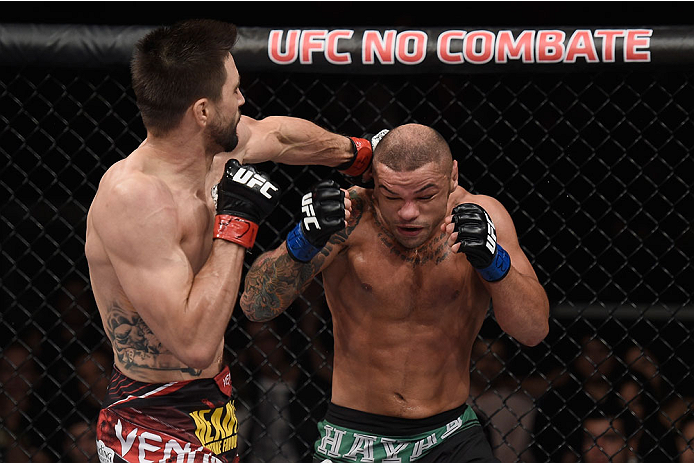 GOIANIA, BRAZIL - MAY 30: Carlos Condit of the United States punches Thiago Alves of Brazil in their welterweight UFC bout during the UFC Fight Night event at Arena Goiania on May 30, 2015 in Goiania, Brazil. (Photo by Buda Mendes/Zuffa LLC/Zuffa LLC vi