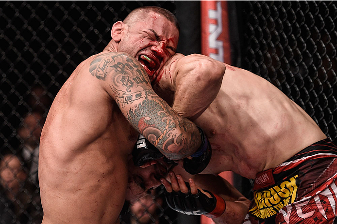 GOIANIA, BRAZIL - MAY 30: Thiago Alves of Brazil punches Carlos Condit of the United States in their welterweight UFC bout during the UFC Fight Night event at Arena Goiania on May 30, 2015 in Goiania, Brazil. (Photo by Buda Mendes/Zuffa LLC/Zuffa LLC vi