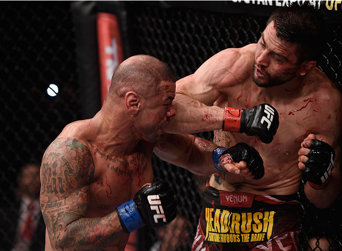 GOIANIA, BRAZIL - MAY 30: Carlos Condit of the United States punches Thiago Alves of Brazil in their welterweight UFC bout during the UFC Fight Night event at Arena Goiania on May 30, 2015 in Goiania, Brazil. (Photo by Buda Mendes/Zuffa LLC/Zuffa LLC vi