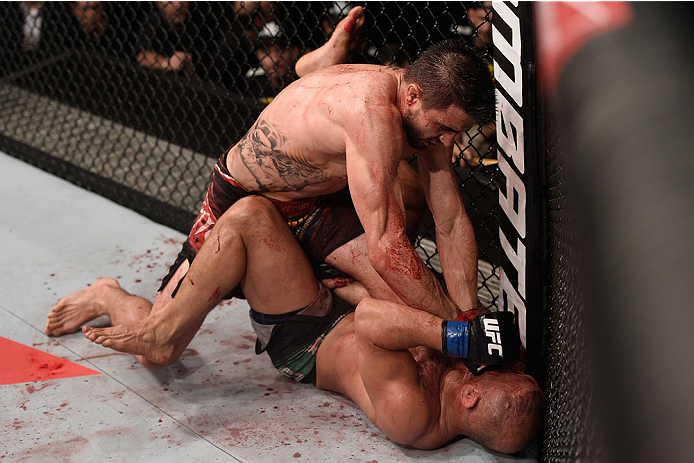 GOIANIA, BRAZIL - MAY 30: Carlos Condit of the United States punches Thiago Alves of Brazil in their welterweight UFC bout during the UFC Fight Night event at Arena Goiania on May 30, 2015 in Goiania, Brazil. (Photo by Buda Mendes/Zuffa LLC/Zuffa LLC vi