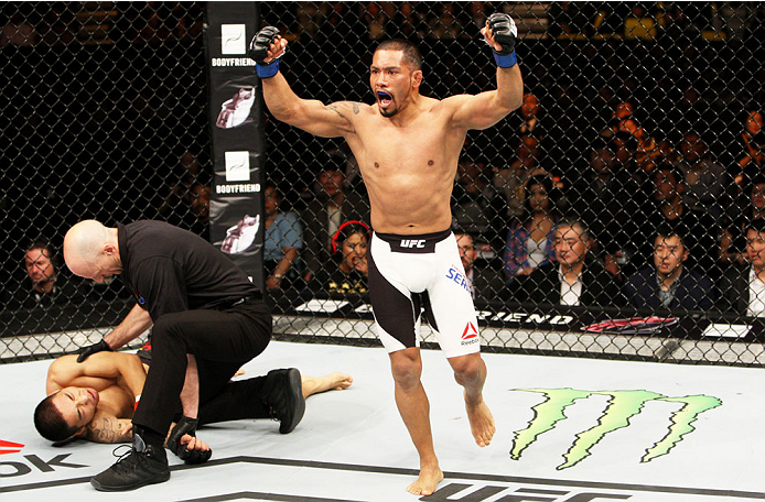 SEOUL, SOUTH KOREA - NOVEMBER 28: Fredy Serrano of Colombia celebrates his TKO victory over Yao Zhikui of China in their flyweight bout during the UFC Fight Night at the Olympic Park Gymnastics Arena on November 28, 2015 in Seoul, South Korea. (Photo by