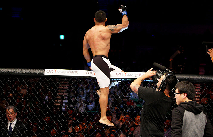 SEOUL, SOUTH KOREA - NOVEMBER 28: Fredy Serrano of Colombia celebrates his TKO victory over Yao Zhikui of China in their flyweight bout during the UFC Fight Night at the Olympic Park Gymnastics Arena on November 28, 2015 in Seoul, South Korea. (Photo by