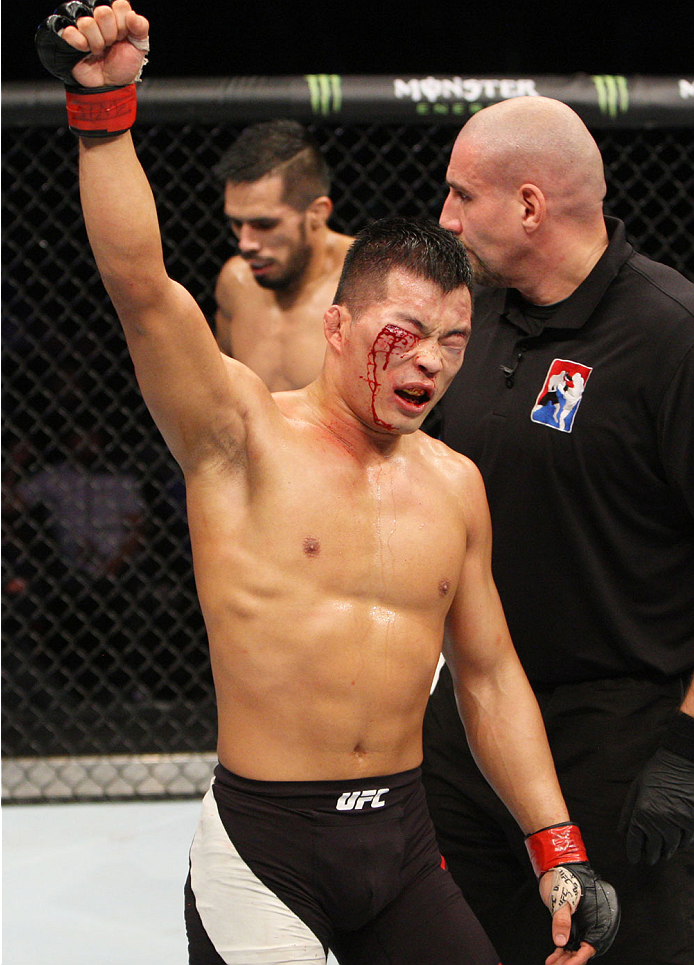 SEOUL, SOUTH KOREA - NOVEMBER 28: Yui Chul Nam of South Korea reacts after the fight is over during the UFC Fight Night at the Olympic Park Gymnastics Arena on November 28, 2015 in Seoul, South Korea. (Photo by Mitch Viquez/Zuffa LLC/Zuffa LLC via Getty