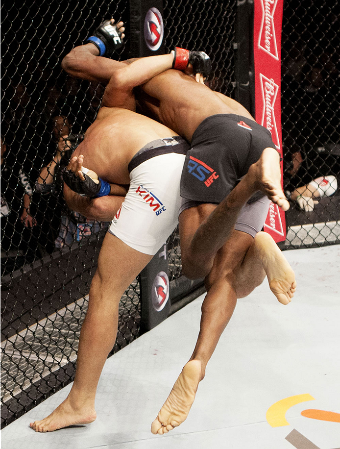 SEOUL, SOUTH KOREA - NOVEMBER 28: (From L to R) Dong Hyun Kim of South Korea takes down Dominic Waters of the United States of America grapple for control in their welterweight bout during the UFC Fight Night at the Olympic Park Gymnastics Arena on Nove