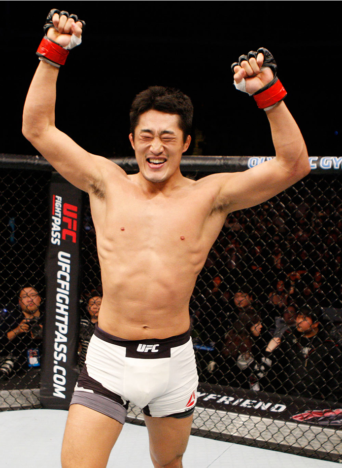 SEOUL, SOUTH KOREA - NOVEMBER 28: Dong Hyun Kim of South Korea celebrates his win over Dominic Waters of the United States of America in their welterweight bout during the UFC Fight Night at the Olympic Park Gymnastics Arena on November 28, 2015 in Seoul