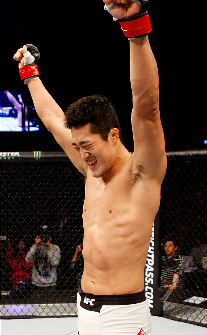 SEOUL, SOUTH KOREA - NOVEMBER 28: Dong Hyun Kim of South Korea celebrates his win over Dominic Waters of the United States of America in their welterweight bout during the UFC Fight Night at the Olympic Park Gymnastics Arena on November 28, 2015 in Seoul