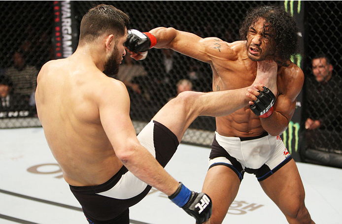 SEOUL, SOUTH KOREA - NOVEMBER 28: Jorge Masvidal of the United States of America kicks Benson Henderson of the United States of America in their welterweight bout during the UFC Fight Night at the Olympic Park Gymnastics Arena on November 28, 2015 in Seo