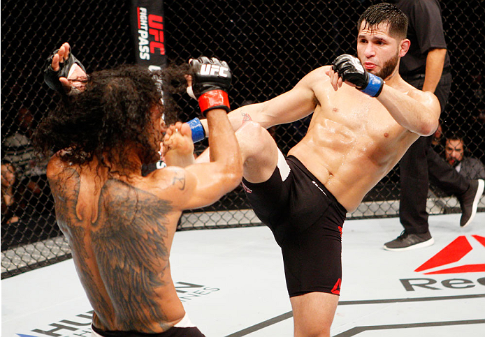 SEOUL, SOUTH KOREA - NOVEMBER 28: Jorge Masvidal of the United States of America throws a kick at Jorge Masvidal of the United States of America in their welterweight bout during the UFC Fight Night at the Olympic Park Gymnastics Arena on November 28, 201