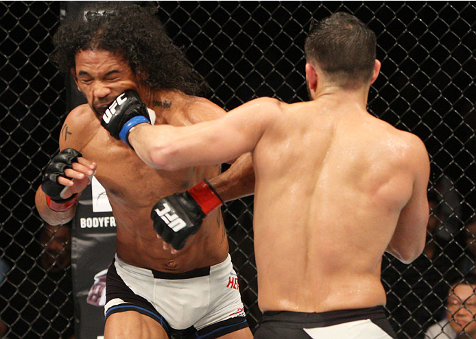 SEOUL, SOUTH KOREA - NOVEMBER 28: Jorge Masvidal of the United States of America punches Benson Henderson of the United States of America in their welterweight bout during the UFC Fight Night at the Olympic Park Gymnastics Arena on November 28, 2015 in S