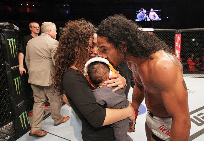 SEOUL, SOUTH KOREA - NOVEMBER 28: Benson Henderson of the United States of America celebrates with his family after his win over Jorge Masvidal of the United States of America in their welterweight bout during the UFC Fight Night at the Olympic Park Gymn