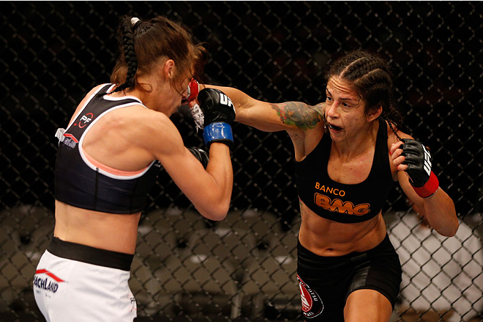 SAN JOSE, CA - JULY 26: (R-L) Julianna Lima punches Joanna Jedrzejczyk in their womens strawweight bout during the UFC Fight Night event at SAP Center on July 26, 2014 in San Jose, California. (Photo by Josh Hedges/Zuffa LLC/Zuffa LLC via Getty Images)