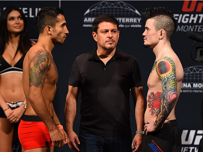 MONTERREY, MEXICO - NOVEMBER 20: (L-R) Opponents Alejandro Perez of Mexico and Scott Jorgensen of the United States face off during the UFC weigh-in at the Arena Monterrey on November 20, 2015 in Monterrey, Mexico. (Photo by Jeff Bottari/Zuffa LLC/Zuffa