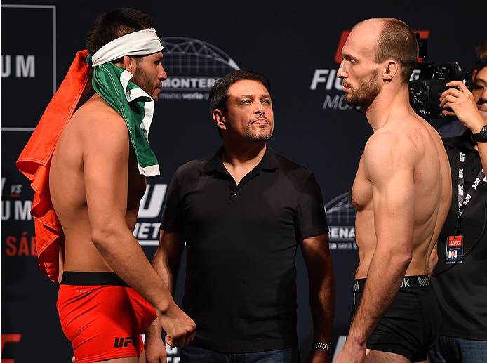 MONTERREY, MEXICO - NOVEMBER 20: (L-R) Opponents Hector Urbina of Mexico and Bartosz Fabinski of Poland face off during the UFC weigh-in at the Arena Monterrey on November 20, 2015 in Monterrey, Mexico. (Photo by Jeff Bottari/Zuffa LLC/Zuffa LLC via Gett