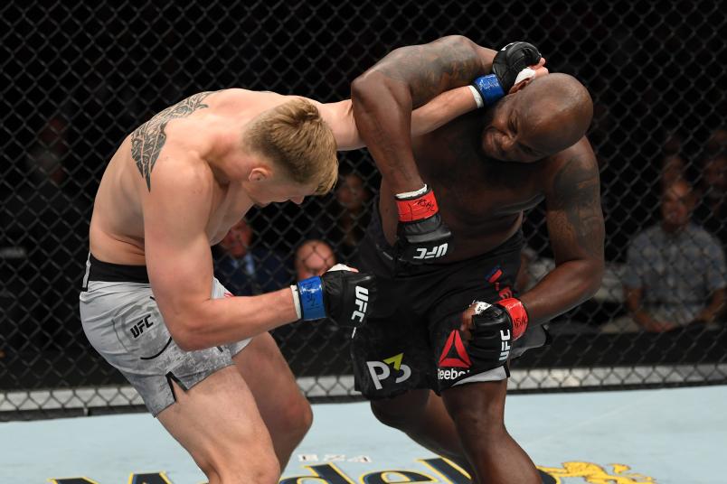 Derrick Lewis punches Alexander Volkov in their heavyweight bout during the UFC 229 event inside T-Mobile Arena on October 6, 2018 in Las Vegas, Nevada.
