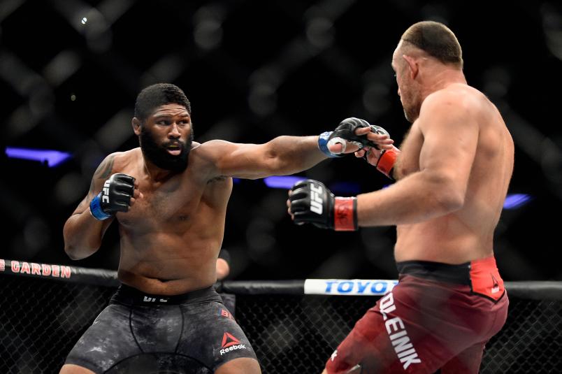 Curtis Blaydes punches Aleksei Oleinik in their heavyweight bout during the UFC 217 event at Madison Square Garden on November 4, 2017 in New York City.