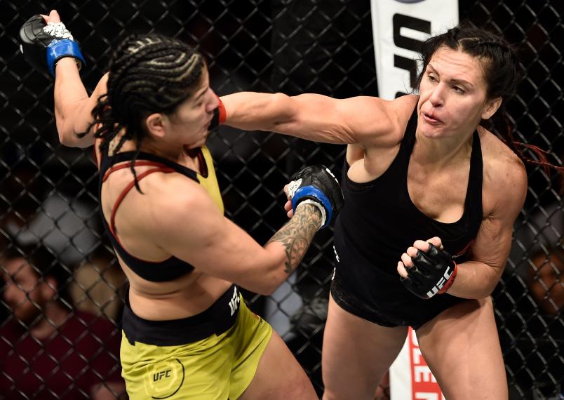 LAS VEGAS, NV - MARCH 03: (R-L) Cat Zingano punches Ketlen Vieira of Brazil in their women's bantamweight bout during the UFC 222 event inside T-Mobile Arena on March 3, 2018 in Las Vegas, Nevada. (Photo by Jeff Bottari/Zuffa LLC via Getty Images)