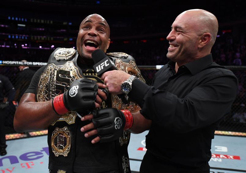 NEW YORK, NY - NOVEMBER 03: Daniel Cormier is interviewed by Joe Rogan after his submission victory over Derrick Lewis in their UFC heavyweight championship bout during the UFC 230 event inside Madison Square Garden on November 3, 2018 in New York, New York. (Photo by Jeff Bottari/Zuffa LLC via Getty Images)