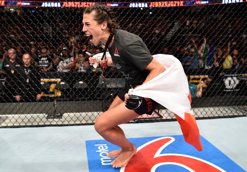CALGARY, AB - JULY 28: Joanna Jedrzejczyk of Poland celebrates after he decision victory over Tecia Torres in their women's strawweight bout during the UFC Fight Night event at Scotiabank Saddledome on July 28, 2018 in Calgary, Alberta, Canada. (Photo by Jeff Bottari/Zuffa LLC/Zuffa LLC via Getty Images)