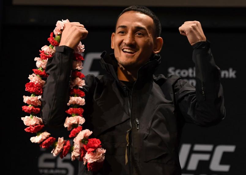 TORONTO, CANADA - DECEMBER 05: UFC featherweight champion Max Holloway interacts with fans and media during the UFC 231 Press Conference at the Winter Garden Theatre on December 5, 2018 in Toronto, Ontario, Canada. (Photo by Josh Hedges/Zuffa LLC/Zuffa LLC via Getty Images)