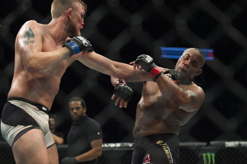 HOUSTON, TX - OCTOBER 03: (R-L) Alexander Gustafsson punches Daniel Cormier in their UFC light heavyweight championship bout during the UFC 192 event at the Toyota Center on October 3, 2015 in Houston, Texas. (Photo by Jeff Bottari/Zuffa LLC/Zuffa LLC via Getty Images)