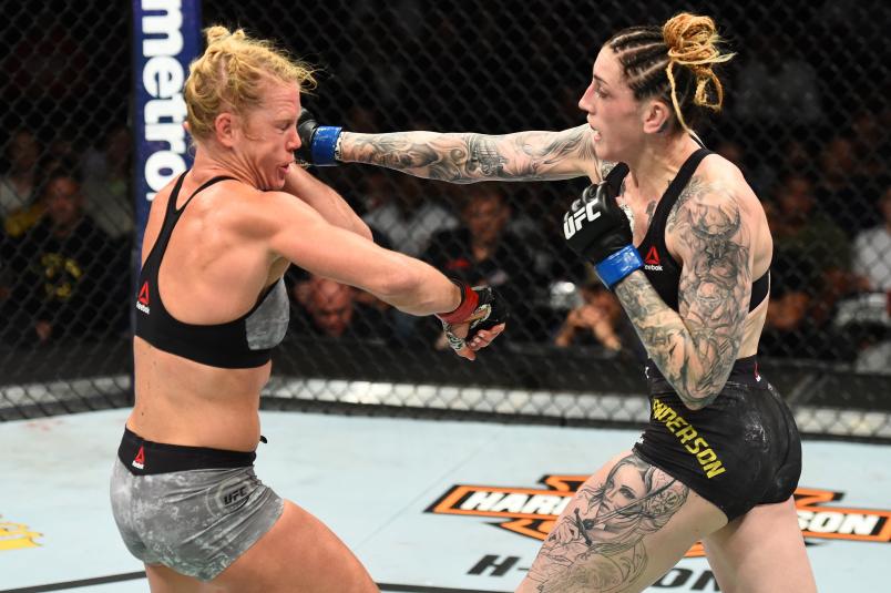 CHICAGO, ILLINOIS - JUNE 09: (R-L) Megan Anderson of Australia punches Holly Holm in their women's featherweight fight during the UFC 225 event at the United Center on June 9, 2018 in Chicago, Illinois. (Photo by Josh Hedges/Zuffa LLC/Zuffa LLC via Getty Images)