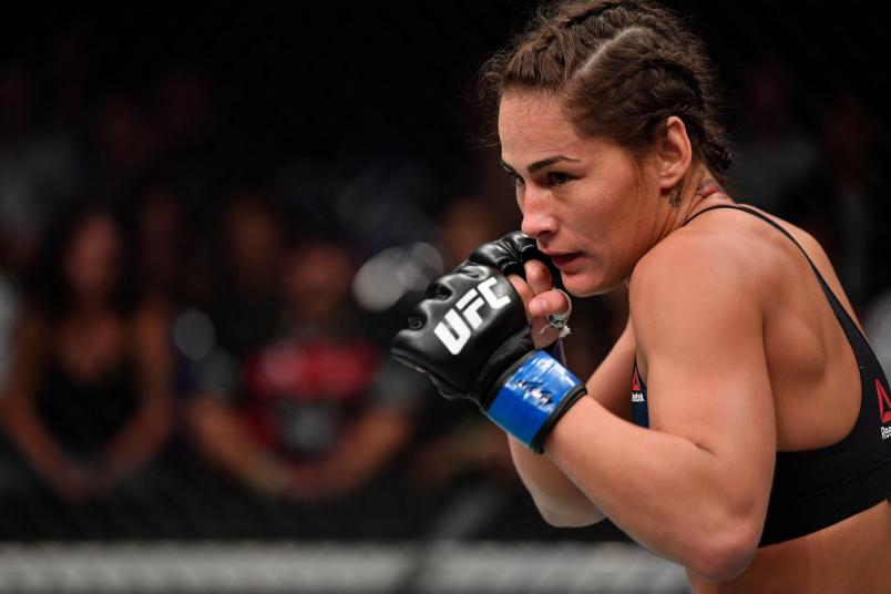SINGAPORE - JUNE 23: Jessica Eye battles Jessica-Rose Clark (not pictured) of Australia in their women's flyweight bout during the UFC Fight Night event at the Singapore Indoor Stadium on June 23, 2018 in Singapore. (Photo by Jeff Bottari/Zuffa LLC/Zuffa LLC via Getty Images)