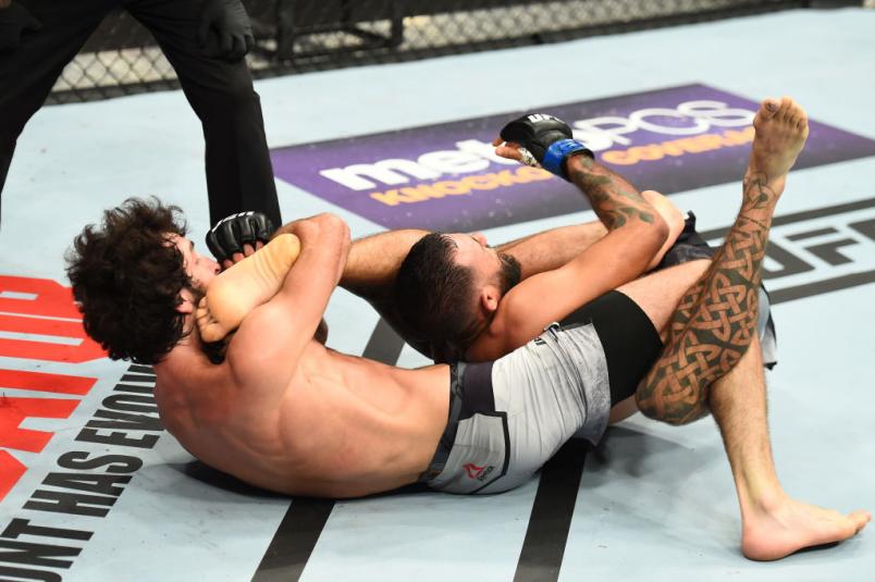 DALLAS, TX - SEPTEMBER 08: (L-R) Zabit Magomedsharipov of Russia attempts to submits Brandon Davis in their featherweight fight during the UFC 228 event at American Airlines Center on September 8, 2018 in Dallas, Texas. (Photo by Josh Hedges/Zuffa LLC/Zuffa LLC via Getty Images)
