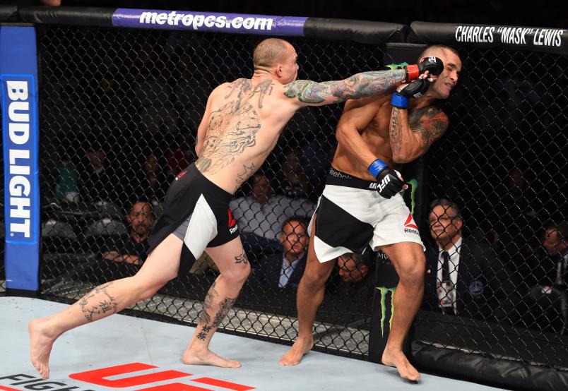 PITTSBURGH, PA - FEBRUARY 21: (L-R) Anthony Smith punches Leonardo Augusto Leleco in their middleweight bout during the UFC Fight Night event at Consol Energy Center on February 21, 2016 in Pittsburgh, Pennsylvania. (Photo by Jeff Bottari/Zuffa LLC/Zuffa LLC via Getty Images)