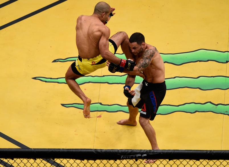 LAS VEGAS, NV - JULY 09: (L-R) Jose Aldo of Brazil punches Frankie Edgar during the UFC 200 event on July 9, 2016 at T-Mobile Arena in Las Vegas, Nevada. (Photo by Jeff Bottari/Zuffa LLC/Zuffa LLC via Getty Images)