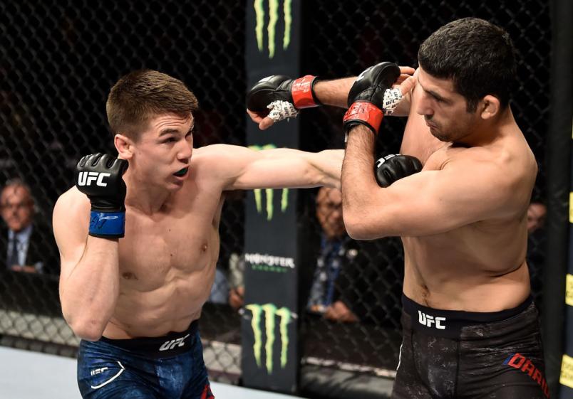 LAS VEGAS, NV - MARCH 03: (L-R) Alexander Hernandez punches Beneil Dariush of Iran in their lightweight bout during the UFC 222 event inside T-Mobile Arena on March 3, 2018 in Las Vegas, Nevada. (Photo by Jeff Bottari/Zuffa LLC/Zuffa LLC via Getty Images)