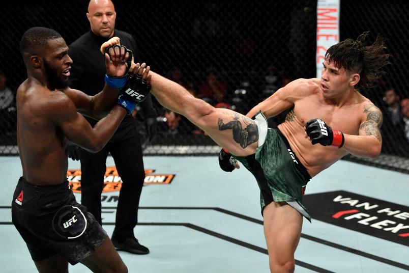 LOS ANGELES, CA - AUGUST 04: (R-L) Ricky Simon kicks Montel Jackson in their bantamweight fight during the UFC 227 event inside Staples Center on August 4, 2018 in Los Angeles, California. (Photo by Jeff Bottari/Zuffa LLC/Zuffa LLC via Getty Images)