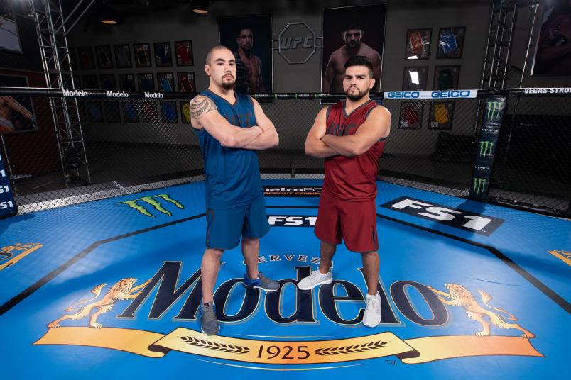 LAS VEGAS, NV - JULY 13: (L-R) Robert Whittaker and Kelvin Gastelum pose for a portrait during the filming of The Ultimate Fighter: Heavy Hitters on July 13, 2018 in Las Vegas, Nevada. (Photo by Jeff Bottari/Zuffa LLC/Zuffa LLC via Getty Images)