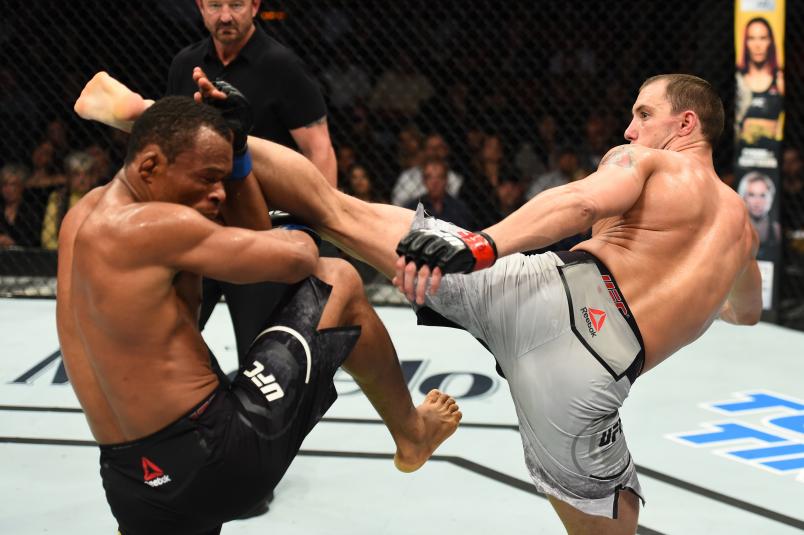 AUSTIN, TX - FEBRUARY 18: James Vick (R) lands a head kick against Francisco Trinaldo of Brazil in their lightweight bout during the UFC Fight Night event at Frank Erwin Center on February 18, 2018 in Austin, Texas. (Photo by Josh Hedges/Zuffa LLC/Zuffa LLC via Getty Images)