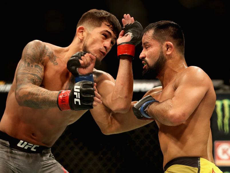 LAS VEGAS, NV - OCTOBER 06: Jussier Formiga of Brazil (R) punches Sergio Pettis (L) in their flyweight bout during the UFC 229 event inside T-Mobile Arena on October 6, 2018 in Las Vegas, Nevada. (Photo by Christian Petersen/Zuffa LLC/Zuffa LLC)