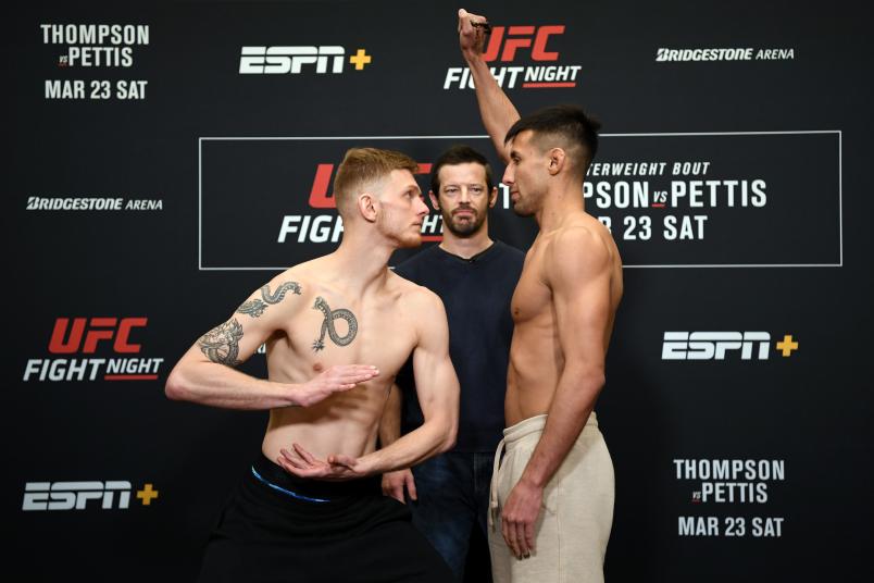 FRANKLIN, TENNESSEE - MARCH 22: (L-R) Ryan MacDonald and Chris Gutierrez face off during the UFC Fight Night weigh-in at Hilton Franklin Cool Springs on March 22, 2019 in Franklin, Tennessee. (Photo by Jeff Bottari/Zuffa LLC/Zuffa LLC via Getty Images)