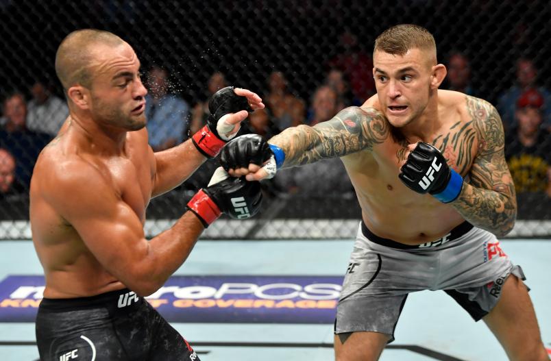 CALGARY, AB - JULY 28: (R-L) Dustin Poirier punches Eddie Alvarez in their lightweight bout during the UFC Fight Night event at Scotiabank Saddledome on July 28, 2018 in Calgary, Alberta, Canada. (Photo by Jeff Bottari/Zuffa LLC/Zuffa LLC via Getty Images)