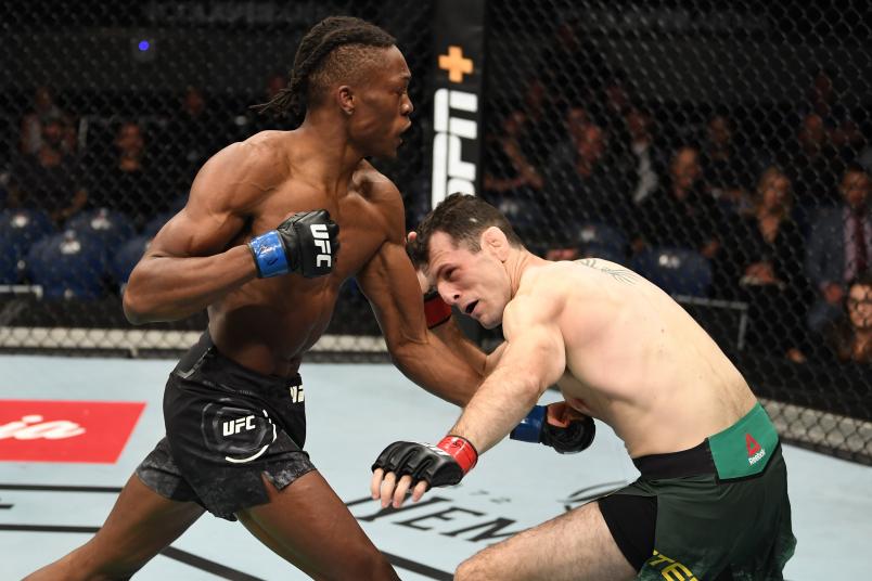 MELBOURNE, AUSTRALIA - FEBRUARY 10: (L-R) Jalin Turner punches Callan Potter of Australia in their lightweight bout during the UFC 234 at Rod Laver Arena on February 10, 2019 in the Melbourne, Australia. (Photo by Jeff Bottari/Zuffa LLC/Zuffa LLC via Getty Images)