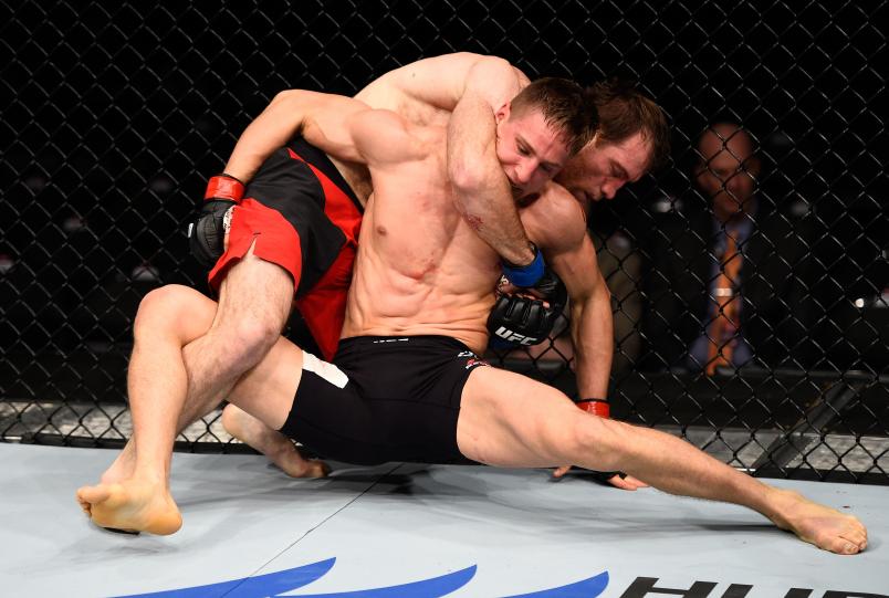 SACRAMENTO, CA - DECEMBER 17: (L-R) Sultan Aliev of Russia controls the body of Bojan Velickovic of Serbia in their welterweight bout during the UFC Fight Night event inside the Golden 1 Center Arena on December 17, 2016 in Sacramento, California. (Photo by Jeff Bottari/Zuffa LLC/Zuffa LLC via Getty Images)