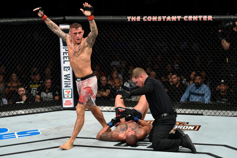 NORFOLK, VA - NOVEMBER 11: (L-R) Dustin Poirier celebrates after defeating Anthony Pettis by TKO in their lightweight bout during the UFC Fight Night event inside the Ted Constant Convention Center on November 11, 2017 in Norfolk, Virginia. (Photo by Brandon Magnus/Zuffa LLC/Zuffa LLC via Getty Images)
