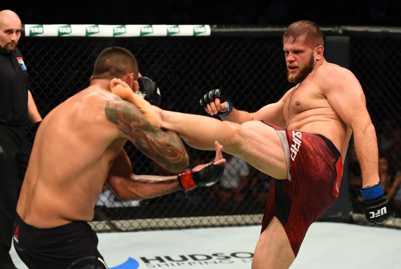 SYDNEY, AUSTRALIA - NOVEMBER 19: (R-L) Marcin Tybura of Poland kicks Fabricio Werdum of Brazil in their heavyweight bout during the UFC Fight Night event inside the Qudos Bank Arena on November 19, 2017 in Sydney, Australia. (Photo by Josh Hedges/Zuffa LLC/Zuffa LLC via Getty Images)