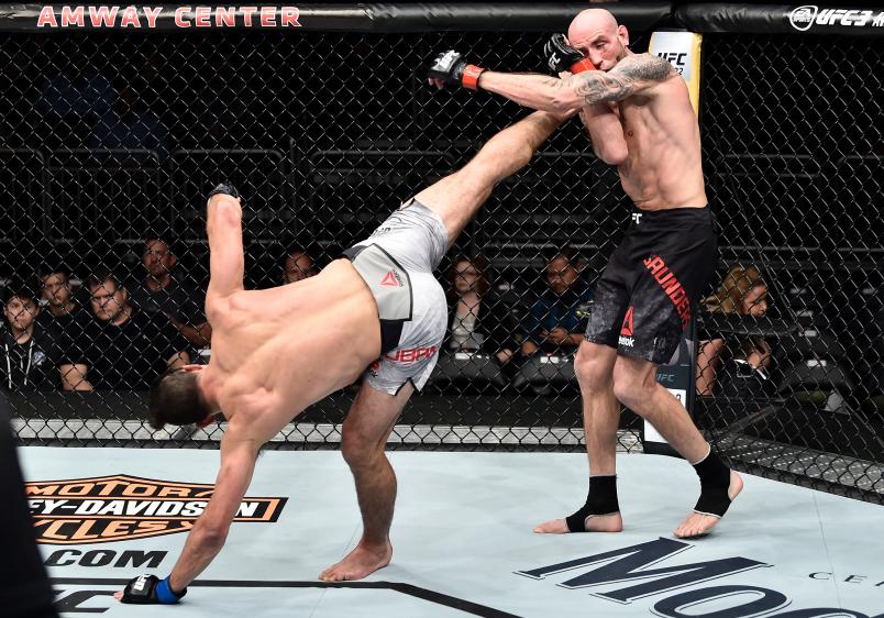 ORLANDO, FL - FEBRUARY 24: (L-R) Alan Jouban kicks Ben Saunders in their welterweight bout during the UFC Fight Night event at Amway Center on February 24, 2018 in Orlando, Florida. (Photo by Jeff Bottari/Zuffa LLC/Zuffa LLC via Getty Images)