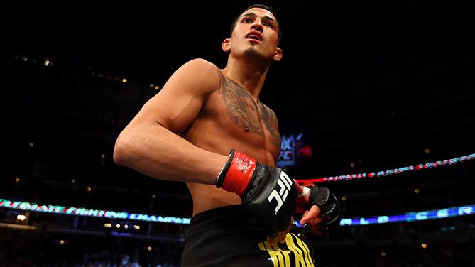 CHICAGO, IL - JANUARY 26: Anthony Pettis celebrates defeating Donald Cerrone during their Lightweight Bout part of UFC on FOX at United Center on January 26, 2013 in Chicago, Illinois. (Photo by Al Bello/Zuffa LLC/Zuffa LLC Via Getty Images)