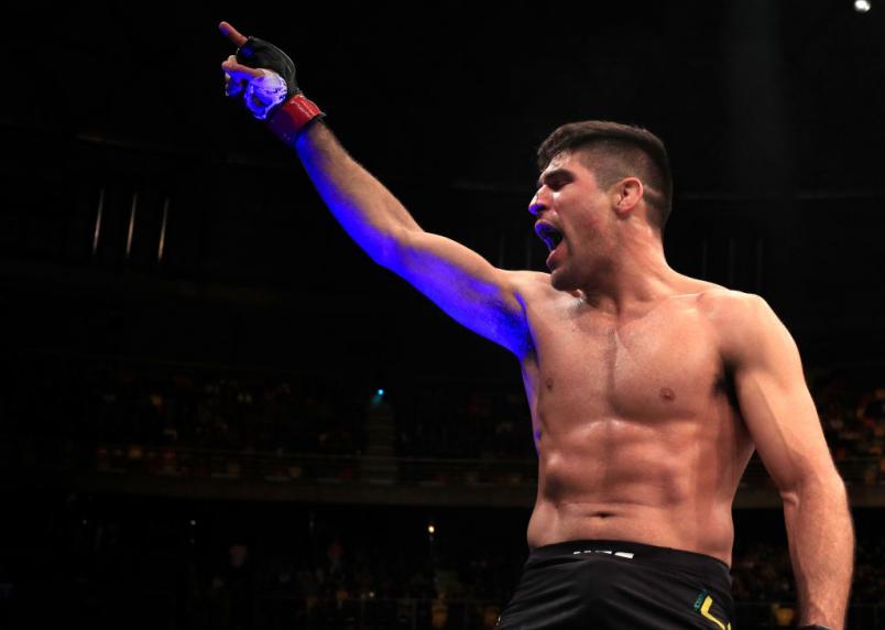 SANTIAGO, CHILE - MAY 19: Vicente Luque celebrates after his knockout victory over Chad Laprise of Canada in their welterweight bout during the UFC Fight Night event at Movistar Arena on May 19, 2018 in Santiago, Chile. (Photo by Buda Mendes/Zuffa LLC/Zu