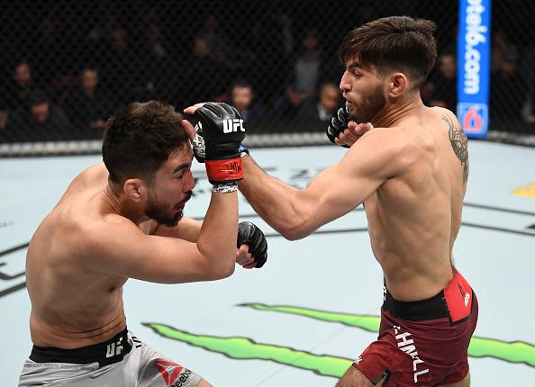 Matt Schnell punches Louis Smolka